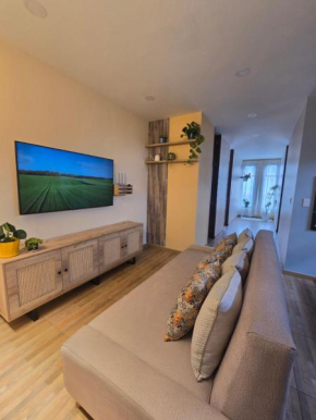 8 minutos del aeropuerto apartamento FAMILIAR lindo y acogedor